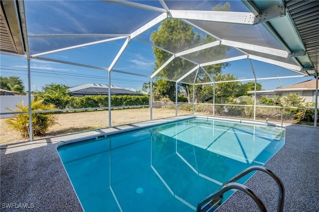 swimming pool with glass enclosure