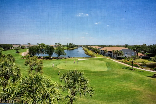 view of property's community with a water view and golf course view