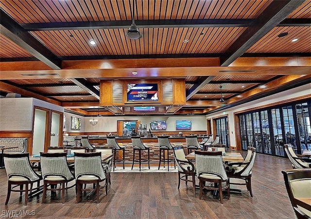 dining area featuring recessed lighting, beamed ceiling, coffered ceiling, and hardwood / wood-style flooring