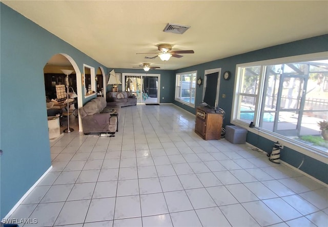 interior space featuring arched walkways and visible vents