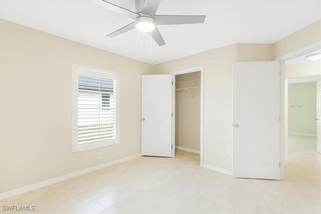 3210 31st St W, Lehigh Acres, FL 33971 - unfurnished bedroom with baseboards, a ceiling fan, light tile patterned floors, and a closet