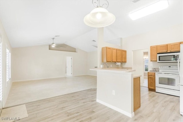 3210 31st St W, Lehigh Acres, FL 33971 - kitchen with light countertops, white range with electric stovetop, a sink, light wood-style flooring, and vaulted ceiling