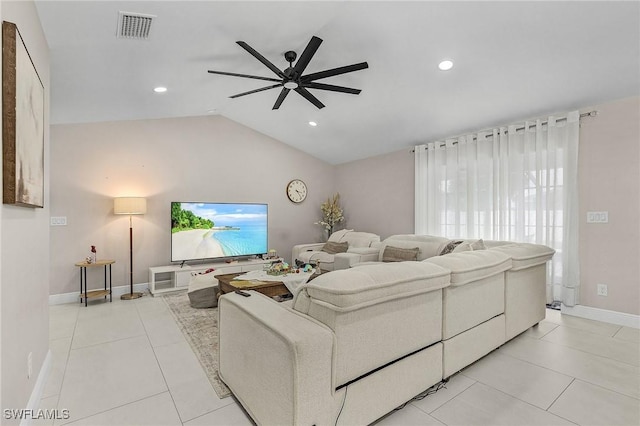 living area with visible vents, ceiling fan, light tile patterned flooring, and lofted ceiling