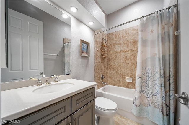 bathroom featuring shower / bath combo with shower curtain, recessed lighting, toilet, and vanity