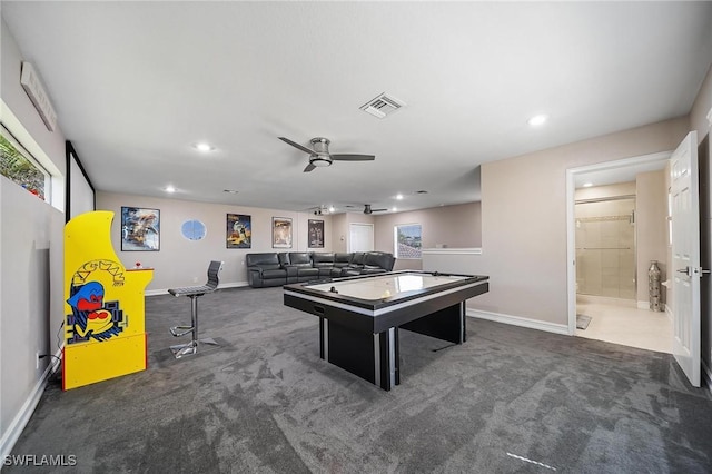 rec room with visible vents, ceiling fan, carpet floors, and baseboards