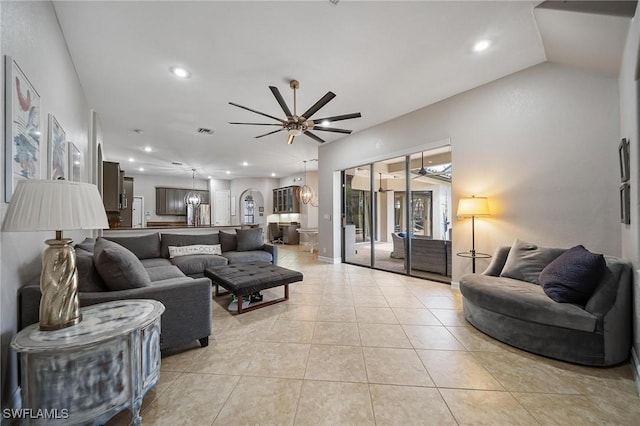 living room with light tile patterned floors, ceiling fan, recessed lighting, and visible vents