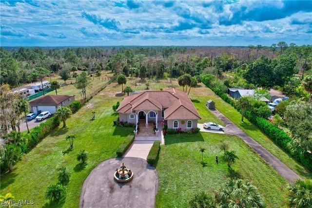 3020 Randall Blvd, Naples, FL 34120 - drone / aerial view featuring a wooded view