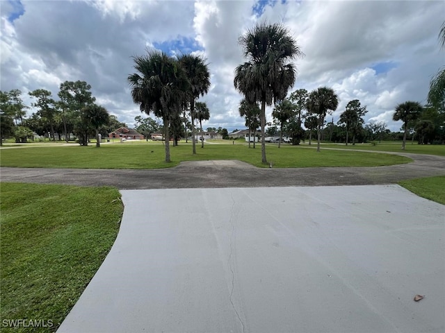 2875 18th Ave SE, Naples, FL 34117 - view of home's community with a yard