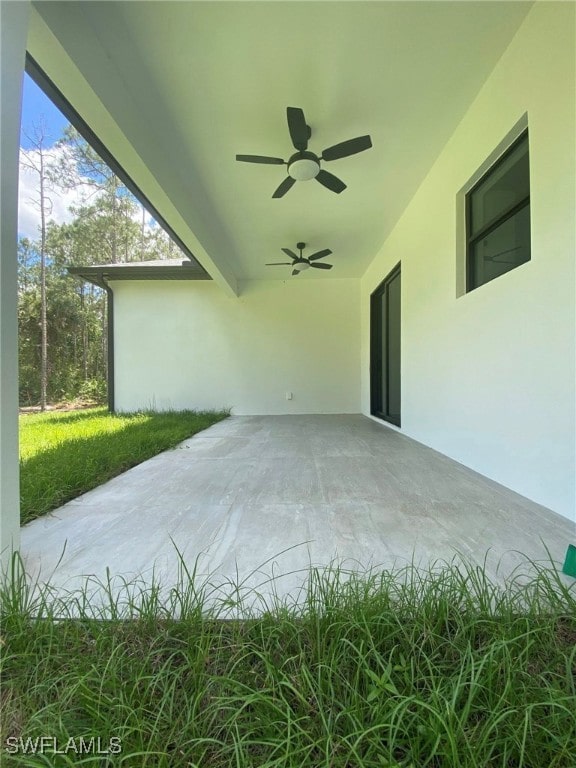 view of patio / terrace featuring a ceiling fan