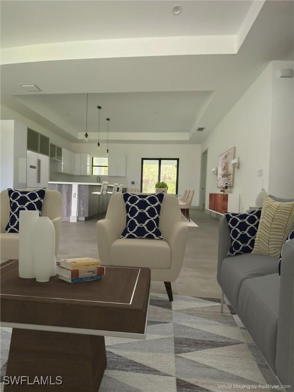 1918 Blue Sage Dr, Naples, FL 34117 - living room featuring a tray ceiling