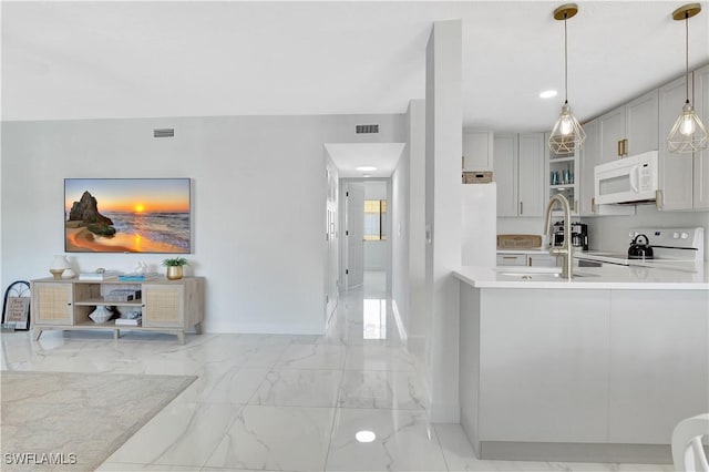 4633 Bayshore Dr Unit M3, Naples, FL 34112 - kitchen with a sink, marble finish floor, white appliances, and visible vents
