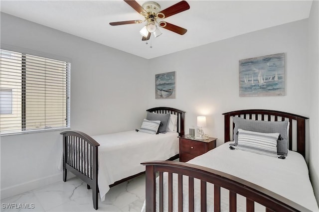 4633 Bayshore Dr Unit M3, Naples, FL 34112 - bedroom with baseboards, marble finish floor, and ceiling fan