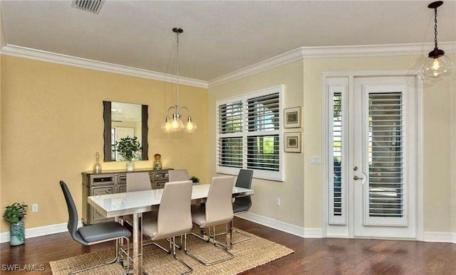 3402 Tigris Ln, Naples, FL 34119 - dining area with ornamental molding, dark wood-style floors, and visible vents