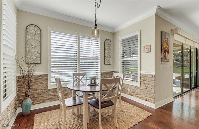 3402 Tigris Ln, Naples, FL 34119 - dining space with wood finished floors and crown molding