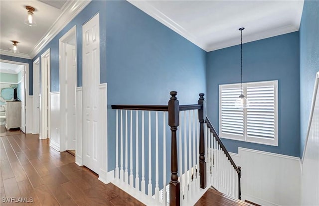 3402 Tigris Ln, Naples, FL 34119 - corridor featuring ornamental molding, an upstairs landing, and dark wood finished floors