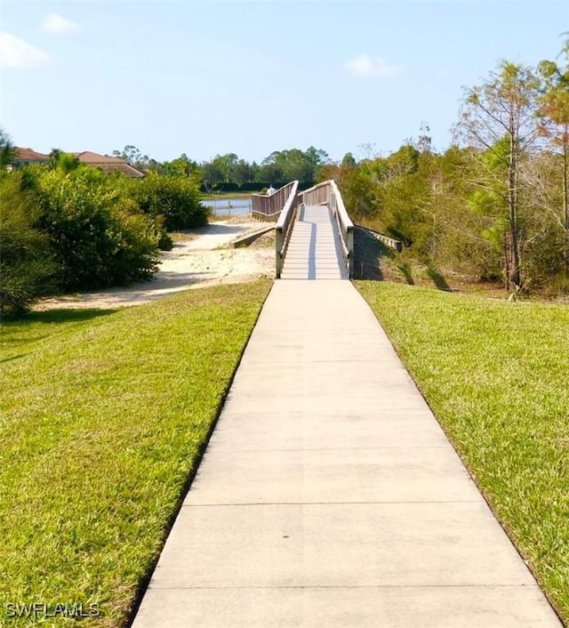3402 Tigris Ln, Naples, FL 34119 - view of property's community featuring a yard