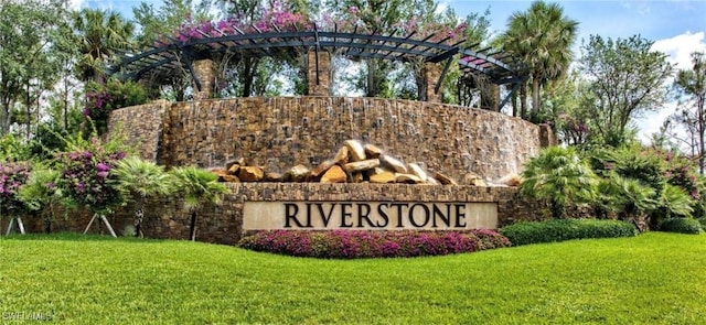 3402 Tigris Ln, Naples, FL 34119 - community / neighborhood sign featuring a yard