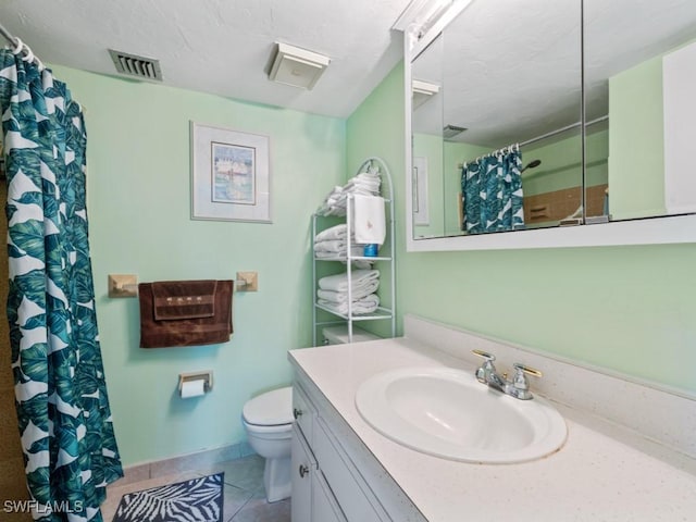 bathroom featuring visible vents, vanity, toilet, tile patterned floors, and a shower with curtain