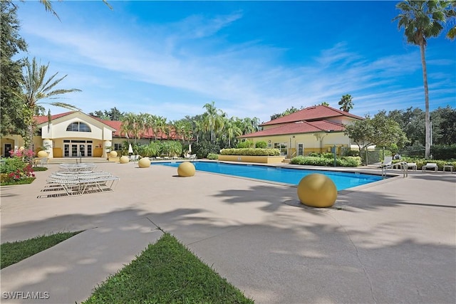 11541 Villa Grand Unit 817, Fort Myers, FL 33913 - pool with a patio and french doors