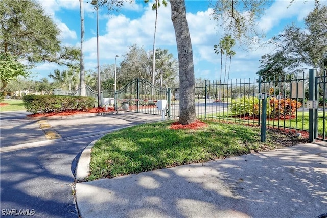 11541 Villa Grand Unit 817, Fort Myers, FL 33913 - view of property's community featuring fence and a gate