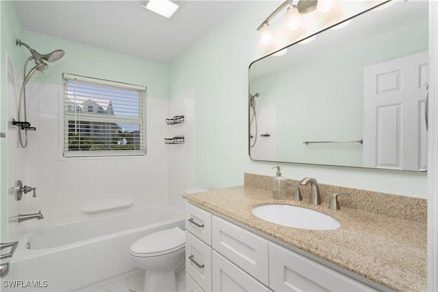 full bathroom featuring marble finish floor, toilet, vanity, visible vents, and washtub / shower combination