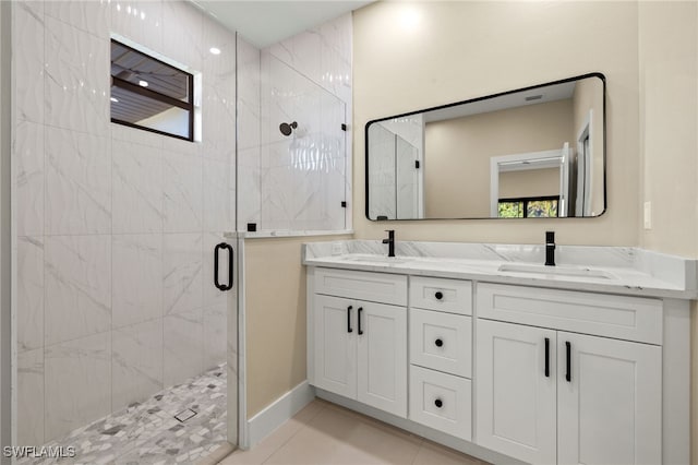 1008 NW 36th Pl, Cape Coral, FL 33993 - full bathroom featuring double vanity, tile patterned floors, a shower stall, and a sink