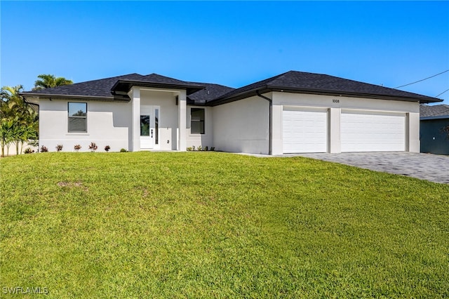1008 NW 36th Pl, Cape Coral, FL 33993 - prairie-style house with decorative driveway, an attached garage, a front yard, and stucco siding