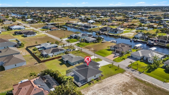 1008 NW 36th Pl, Cape Coral, FL 33993 - bird's eye view with a water view and a residential view