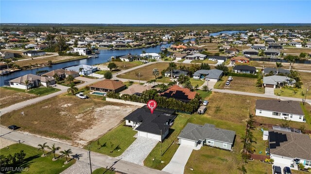 1008 NW 36th Pl, Cape Coral, FL 33993 - aerial view with a water view and a residential view