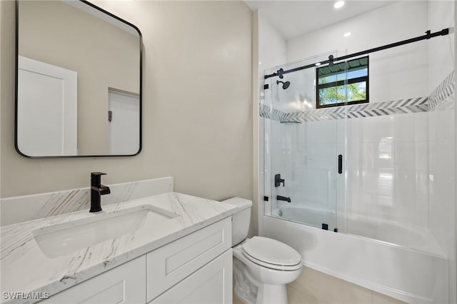 1008 NW 36th Pl, Cape Coral, FL 33993 - bathroom with toilet, bath / shower combo with glass door, and vanity