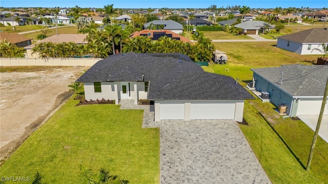 1008 NW 36th Pl, Cape Coral, FL 33993 - bird's eye view with a residential view