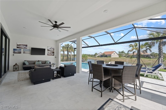 11498 Tiverton Trce, Fort Myers, FL 33913 - view of patio / terrace featuring an outdoor living space, an outdoor pool, ceiling fan, outdoor dining space, and glass enclosure