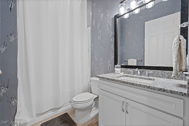 11498 Tiverton Trce, Fort Myers, FL 33913 - full bathroom featuring toilet, wallpapered walls, vanity, and shower / bath combo