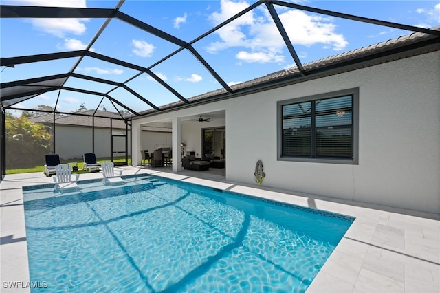 11498 Tiverton Trce, Fort Myers, FL 33913 - swimming pool with a patio area, a ceiling fan, an outdoor hangout area, and glass enclosure