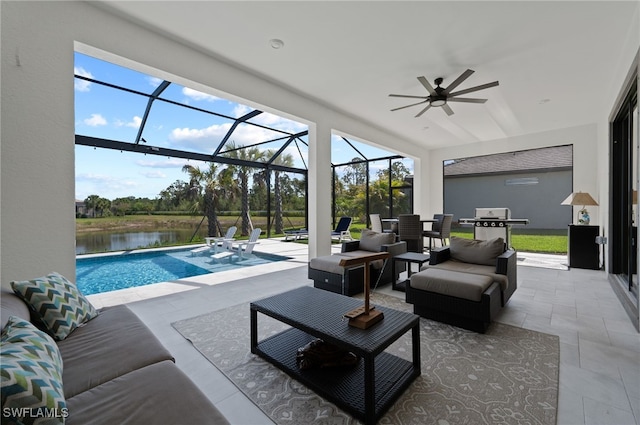 11498 Tiverton Trce, Fort Myers, FL 33913 - view of patio / terrace with outdoor lounge area, a water view, ceiling fan, an outdoor pool, and a lanai