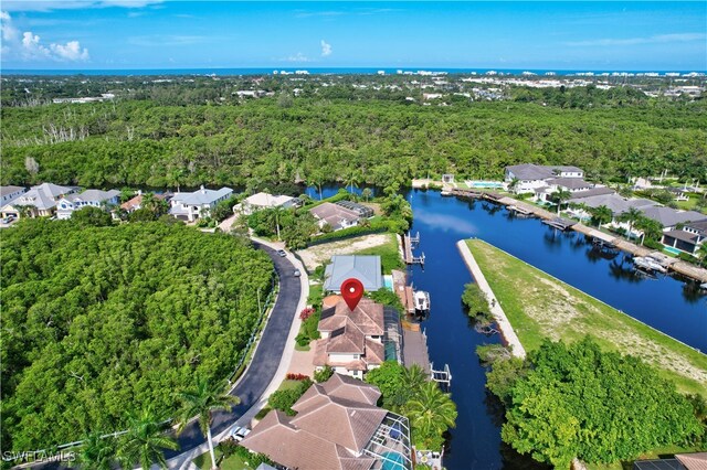 1947 Gordon River Ln, Naples, FL 34104 - bird's eye view with a residential view, a view of trees, and a water view