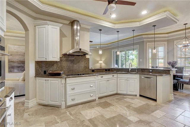 1947 Gordon River Ln, Naples, FL 34104 - kitchen featuring ornamental molding, wall chimney range hood, a tray ceiling, a sink, and dishwasher