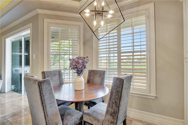 1947 Gordon River Ln, Naples, FL 34104 - dining space featuring an inviting chandelier, baseboards, and crown molding