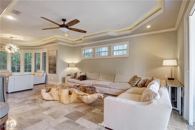 1947 Gordon River Ln, Naples, FL 34104 - living area featuring visible vents, a raised ceiling, baseboards, ceiling fan with notable chandelier, and ornamental molding