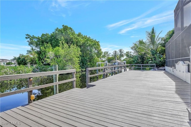 1947 Gordon River Ln, Naples, FL 34104 - wooden deck with glass enclosure