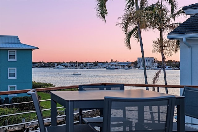 1380 Pelican Ave, Naples, FL 34102 - balcony with a water view and outdoor dining area