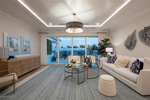 1380 Pelican Ave, Naples, FL 34102 - living area featuring recessed lighting, a raised ceiling, and crown molding