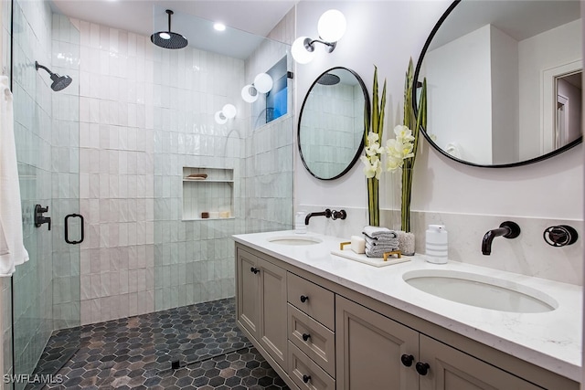 1380 Pelican Ave, Naples, FL 34102 - bathroom with double vanity, tiled shower, and a sink
