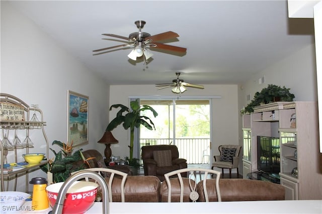 living room featuring ceiling fan