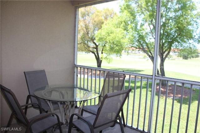 balcony featuring outdoor dining area