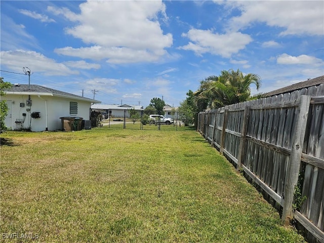 view of yard with fence