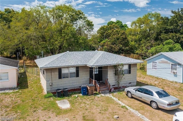 318 Bellair Rd, Fort Myers, FL 33905 - bungalow with a front yard and a shingled roof