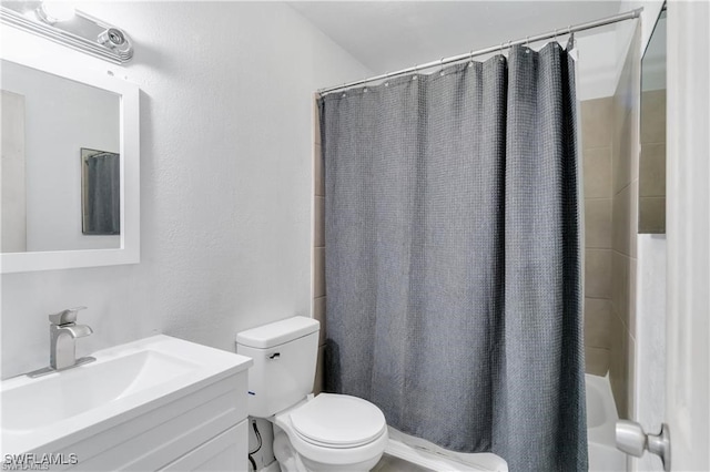 318 Bellair Rd, Fort Myers, FL 33905 - bathroom with shower / bathtub combination with curtain, toilet, a textured wall, and vanity