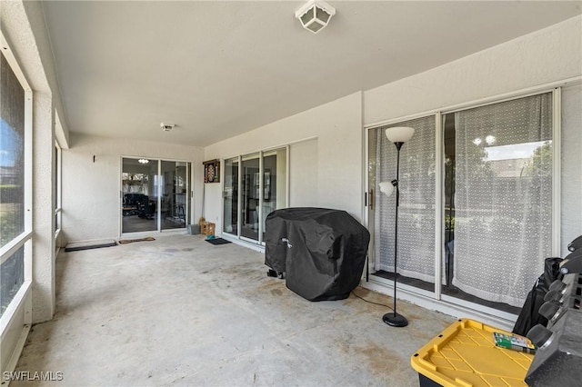 unfurnished sunroom featuring visible vents