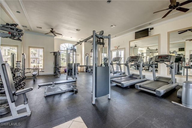 gym with visible vents, ornamental molding, and ceiling fan